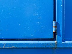 Hinge on blue dumpster.jpg