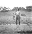 Samuel F. Hildebrand holding newly caught fish (3607612917).jpg