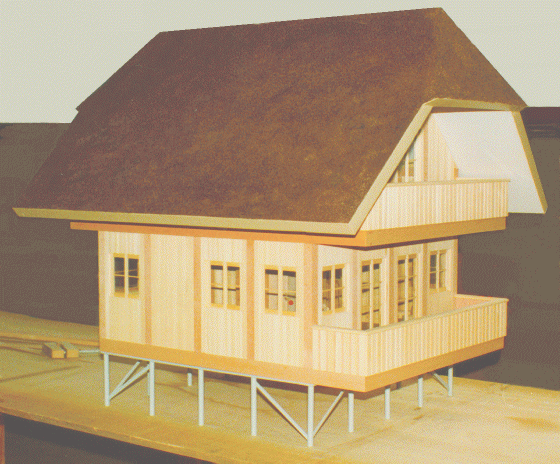 Rustikales Single-Haus mit innovativem Bausystem, Modell, Sdseite